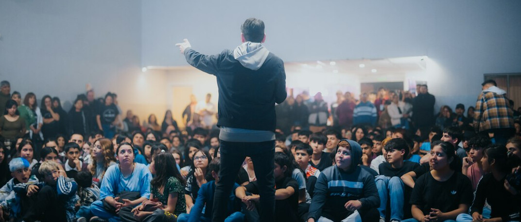 confident speaker engaging crowd